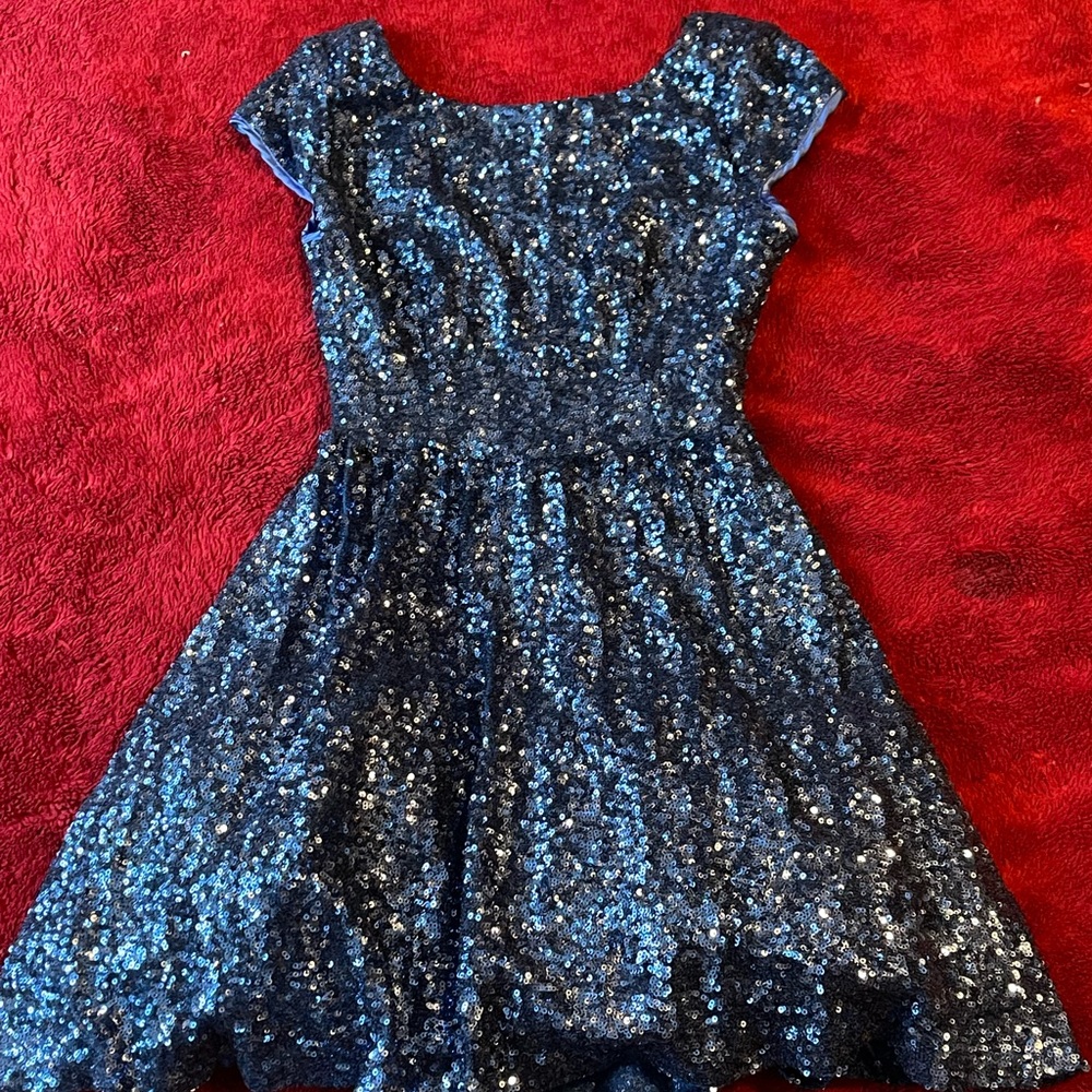 Beautiful dress with sequins and a low cut back